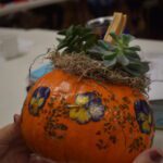 Garden Pansy flower decor on a pumpkin