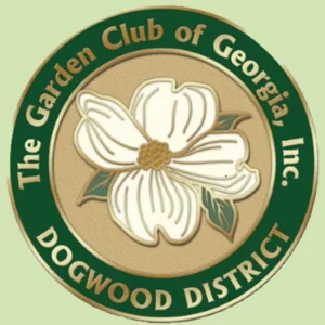 A green and white logo with flowers on it.