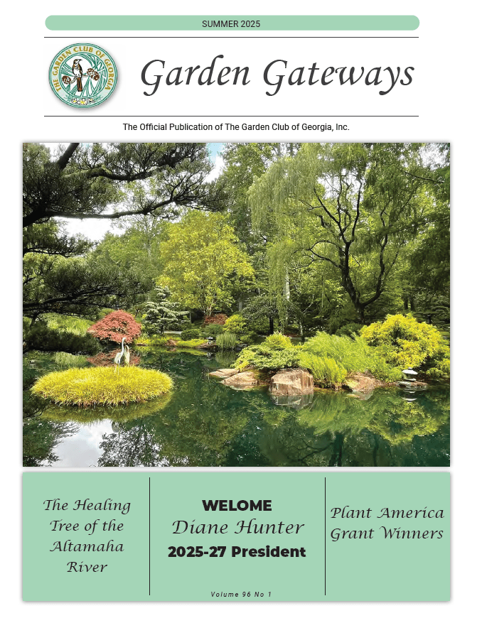 Serene garden pond with lush greenery and ornamental trees.