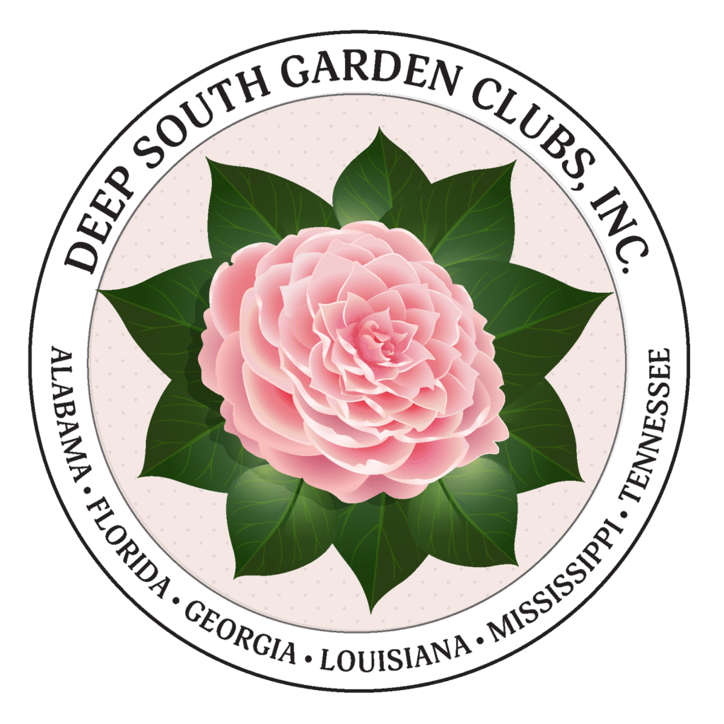 A pink flower with green leaves in the center.