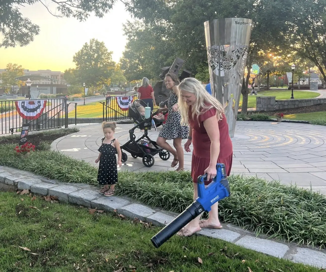 Suwanee Garden Club, a new club, at their first project - cleaning up 9/11 Memorial in Suwanee.